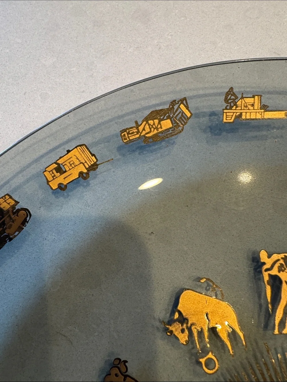 Glass Decorative Plate with Gold Zodiac Accents and heavy equipment